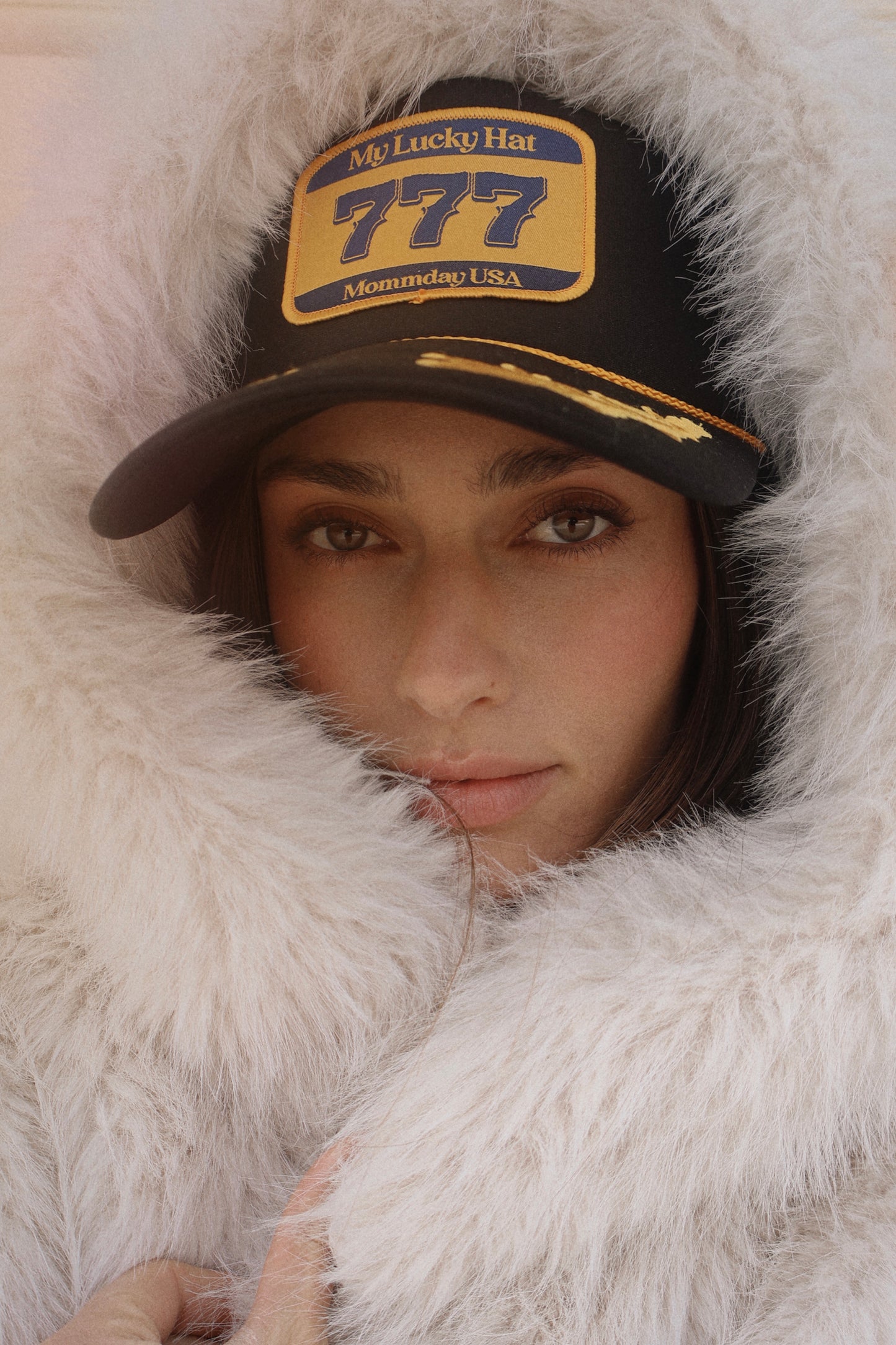 Lucky Hat on Black and Gold Leak Trucker Hat
