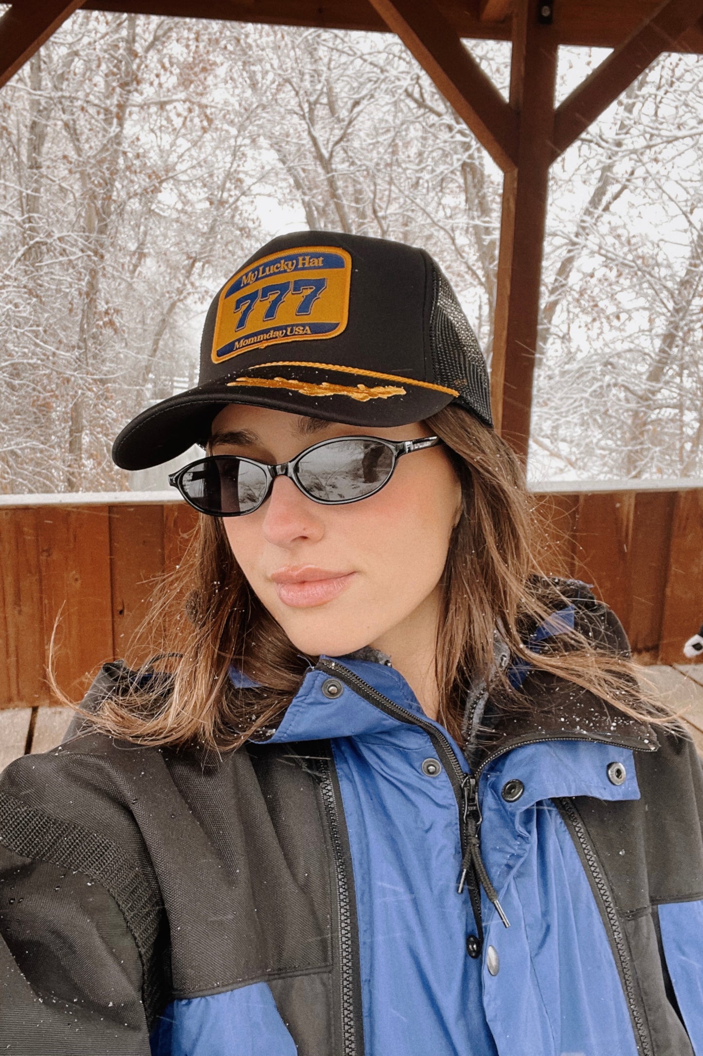Lucky Hat on Black and Gold Leak Trucker Hat