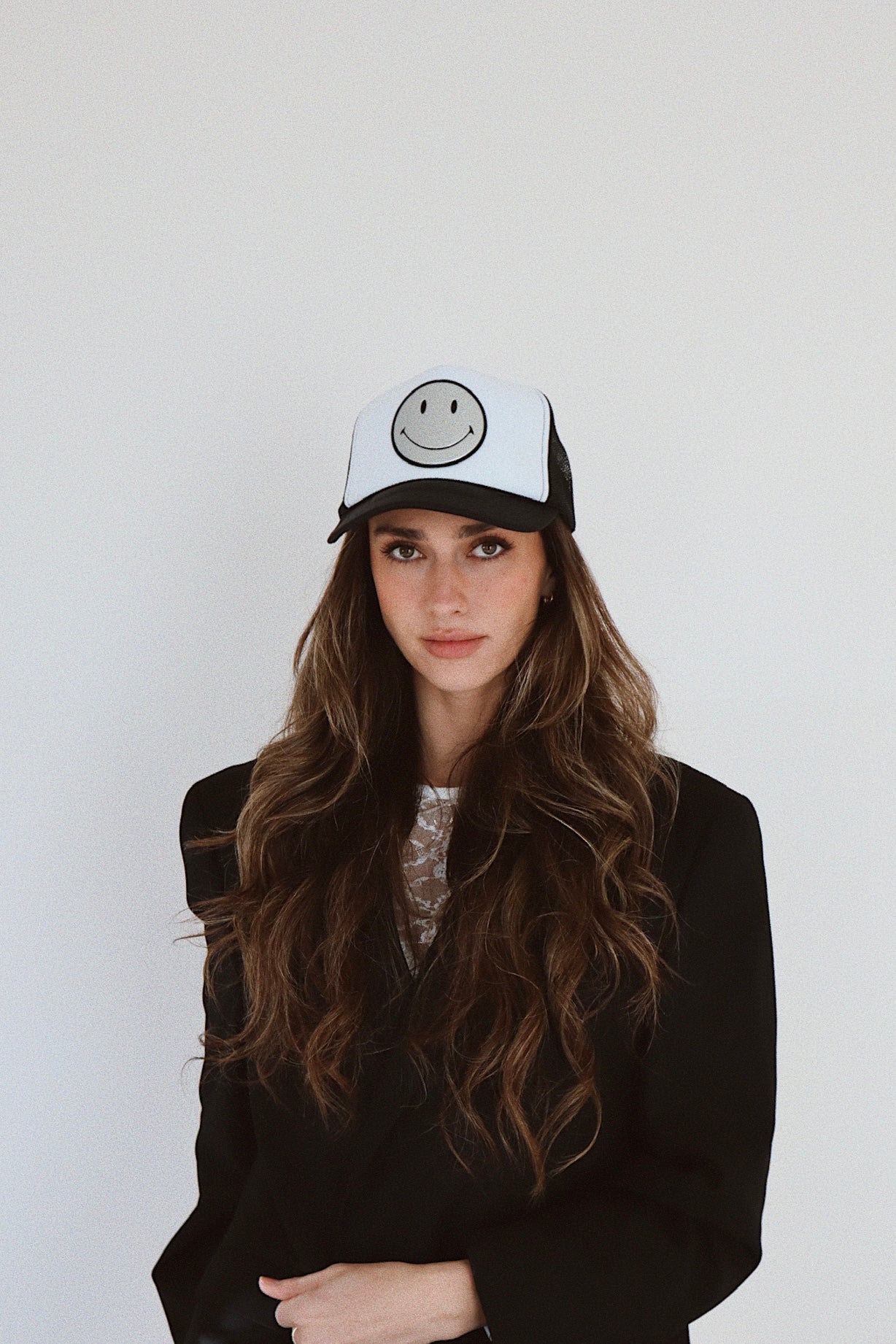 Silver Leather Smiley on Black and White Trucker Hat