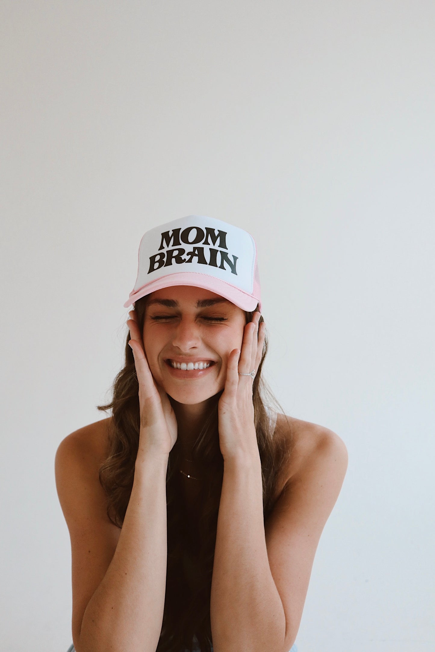 Mom Brain pink and white trucker hat