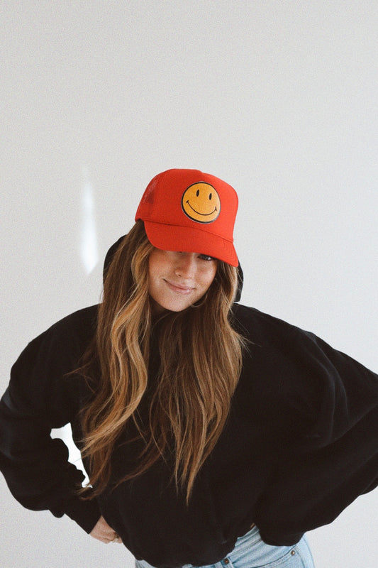 Smiley Yellow Leather on Red Trucker Hat