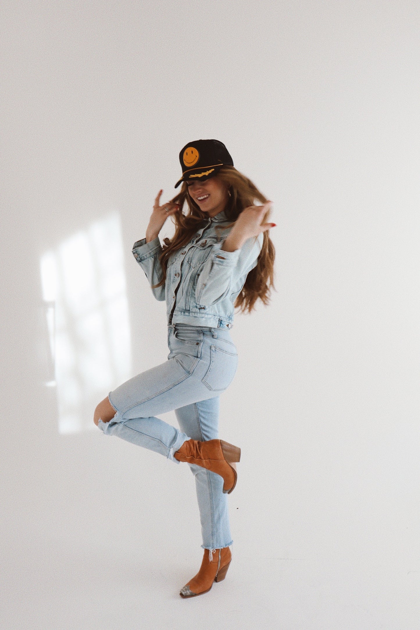 Smiley Yellow Leather On Black and Gold Leaf Trucker Hat