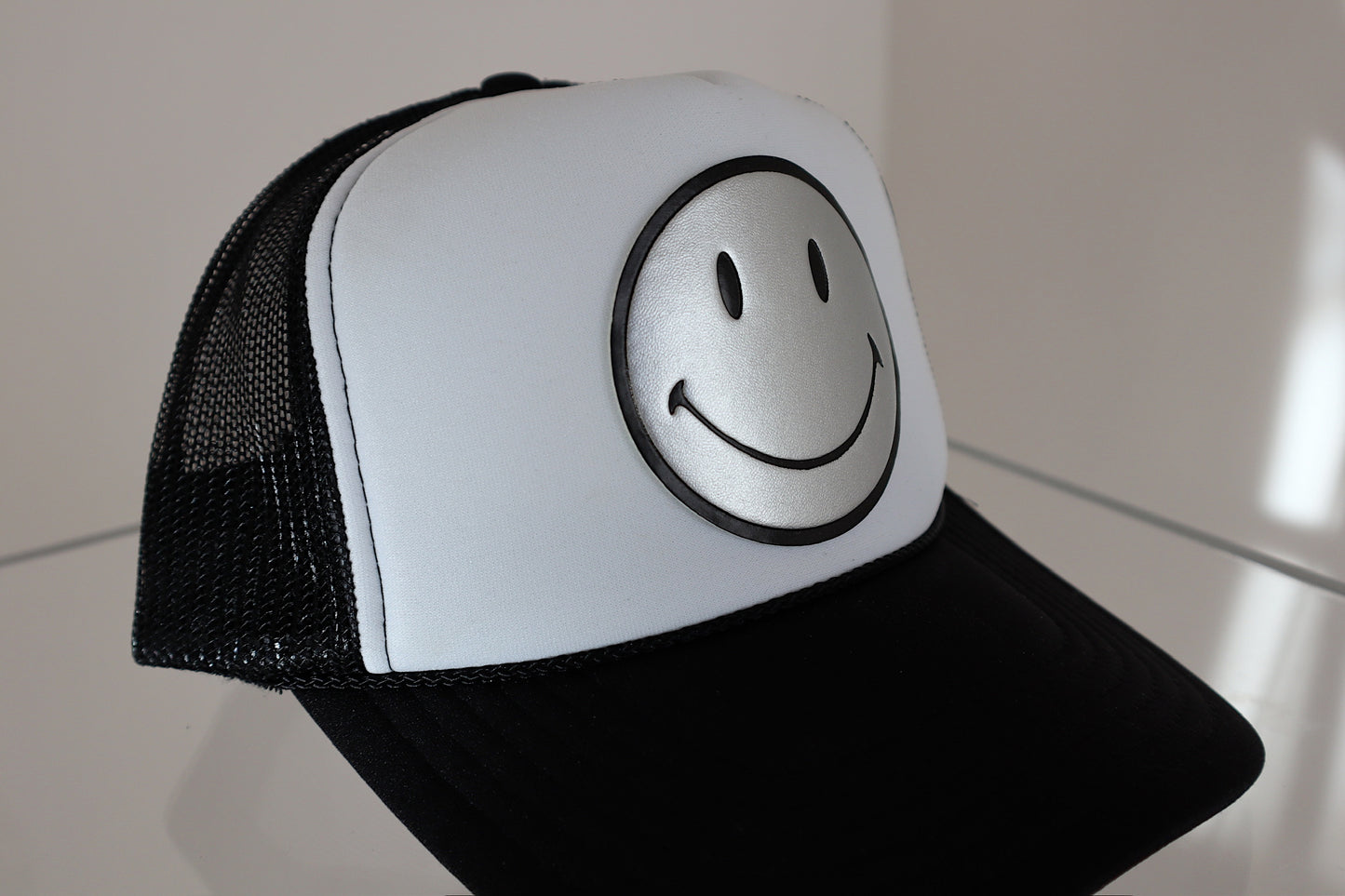 Silver Leather Smiley on Black and White Trucker Hat