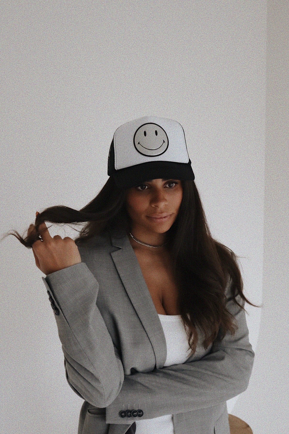 Silver Leather Smiley on Black and White Trucker Hat