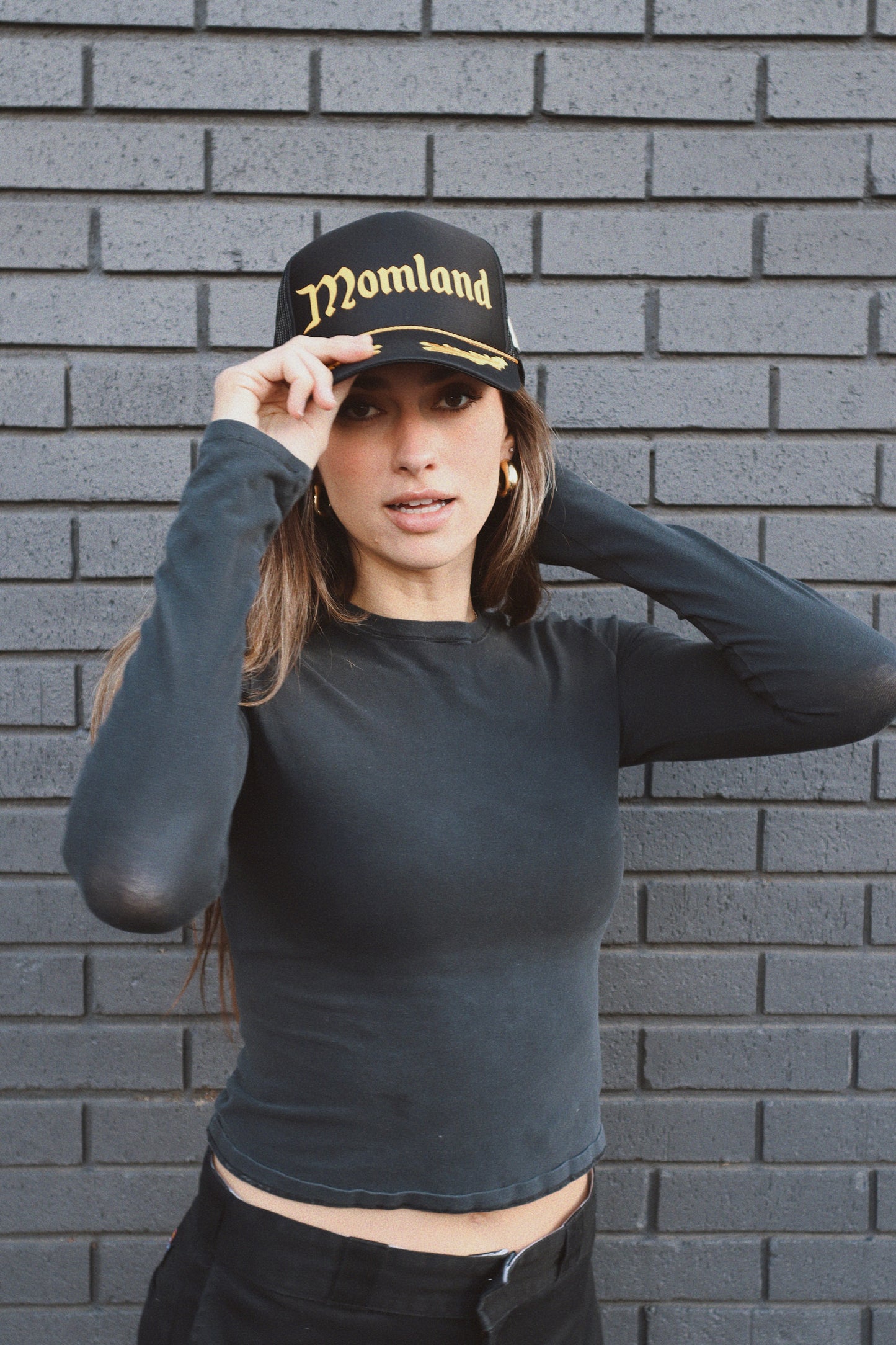 Momland™️ Trucker Hat in black with gold leaf